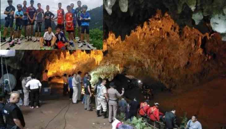 Image result for 12 Teenage Football players with Coach trapped in Thailand Cave