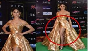 Hate Story 3 actress Urvashi Rautela wore a golden dress at IIFA 2018 and got brutally trolled; Tweeple called it 'sasta shadi ka tent'