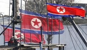 North Korea warns South against violating border to search for official's body in sea