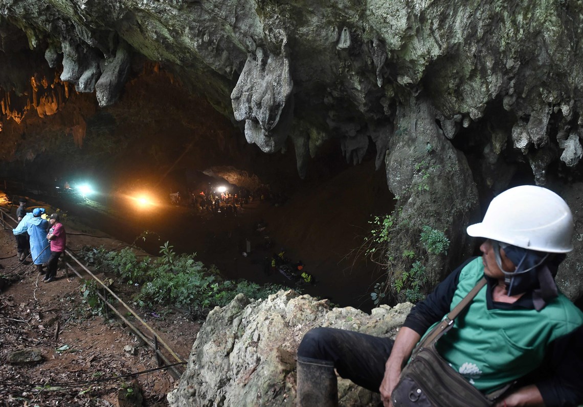 As the search for 12 young soccer players lost in a cave hits day 5, Thailand holds its breath