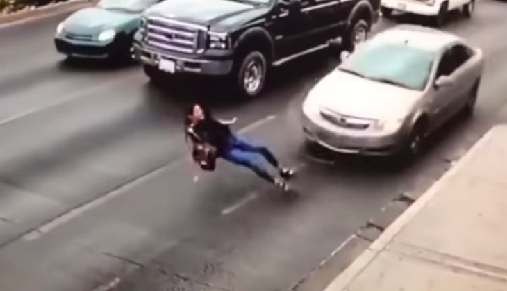 Girl Slip on Busy Road