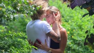 Justin Bieber gives a peck on Hailey Baldwin's forehead in new PDA photos