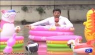 This Pakistani reporter goes overboard to cover monsoon floods