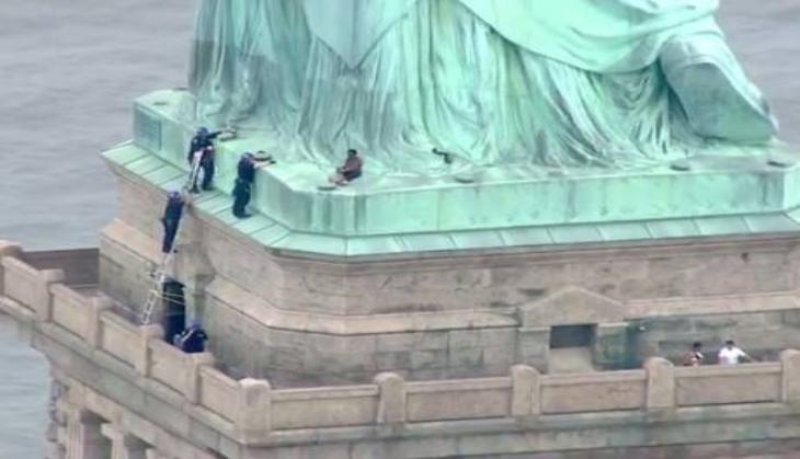 Woman on Statue Of Liberty