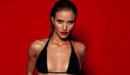 Rosie Huntington-Whiteley shares sensational photo as she poses in lacy red lingerie 