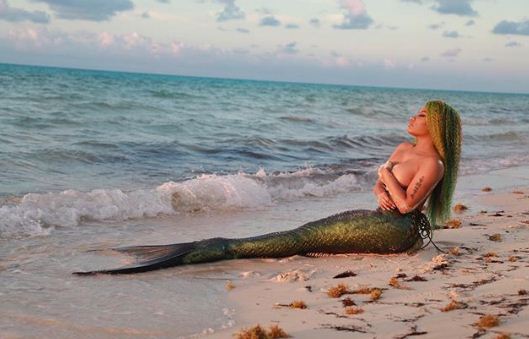 Watch Nicki Minaj go topless as a mermaid for 'Bed' music video with Ariana Grande