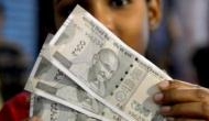 Rupee rises 14 paise to 70.90 against USD in early trade