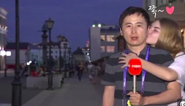 Journalist Kissed by girl