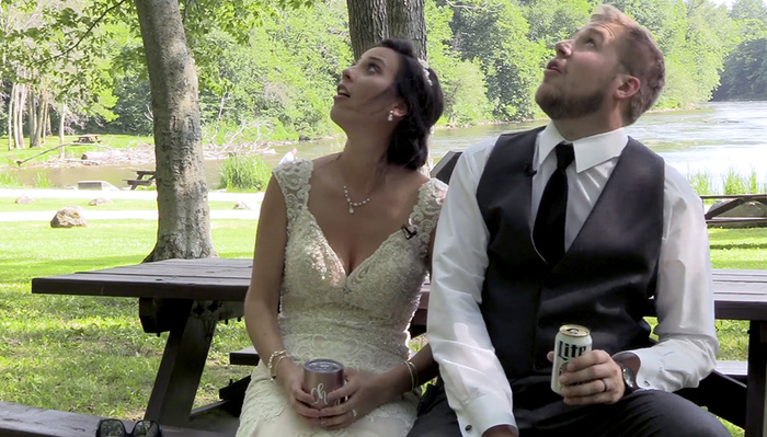 Hilarious! Bride and groom narrowly escape falling tree branch during wedding video shoot