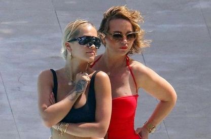 Rita Ora soaks up the sun in thong bikini with her family on French Riviera