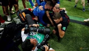 FIFA World Cup 2018: Photographer gets caught up in Croatia's celebration and gets a kiss