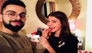 Virat Kohli shared a kissing picture with Anushka Sharma; fans trolled him for hairstyle and said ‘bal ud gaye bhai k?’