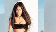 Ciara flaunts her sexy body in leather bikini paired with knee-high heels