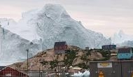 Watch Video: Massive melting iceberg threatens Greenland village