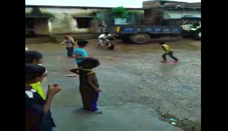 children playing with tyre