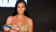 Swimsuit model Mara Martin breastfeeds her daughter while walking Sports Illustrated Swimsuit Runway