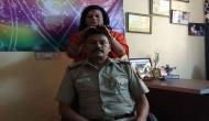 Shocking! Delhi police SHO faces transfer after his photo of'healing session' with godwoman in uniform go viral; see pic