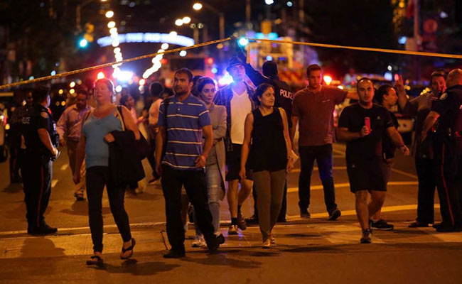 Toronto mass shooting: Gunman dead after killing one, injuring 13 in shooting outside restaurant