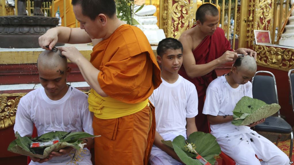 Thai soccer cave boys shave their heads before to become Buddhist novices 