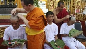 Thai soccer cave boys shave their heads before to become Buddhist novices 