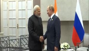 PM Modi meets Russian President Putin