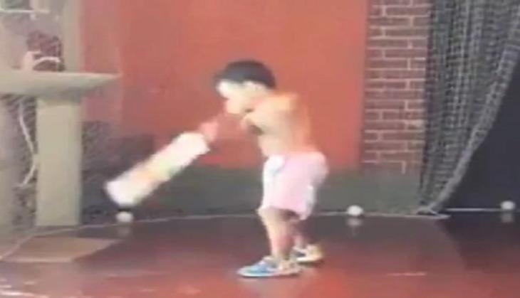 child batting