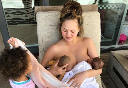 Chrissy Teigen posts nude snap while breastfeeding baby Miles on vacation in Bali