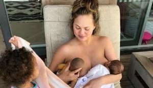 Chrissy Teigen posts nude snap while breastfeeding baby Miles on vacation in Bali