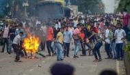 Assam bandh: Protestors squat on tracks, burn tyres