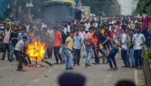 Assam bandh: Protestors squat on tracks, burn tyres