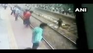 Maharashtra: Man lies on railway track in suicide attempt; see video