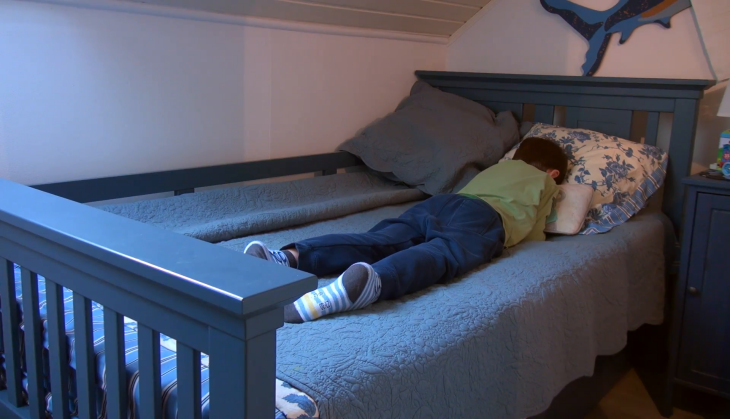 Boy Sleeping on Bed