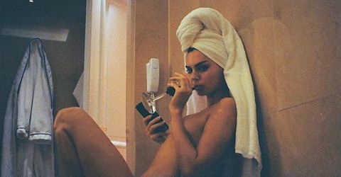 Kendall Jenner shares topless photo as she floats in water for LOVE Magazine photoshoot