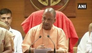 Uttar Pradesh CM Yogi Adityanath hands over Rs 40 lakh cheque to Vivek Tiwari's kin