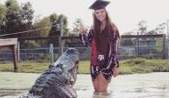 Graduation photos: Texas student poses with 14-ft-long alligator 