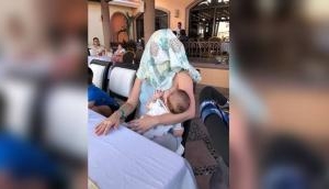 Breastfeeding mother told to cover up  at restaurant in Mexico, instead puts cloth over own face 