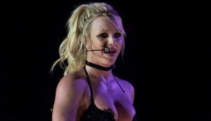 Britney Spears flashes her ni**le covers during 'Piece Of Me Tour' in Germany
