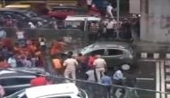Video: Anguished Kanwar pilgrims vandalises, topples woman's car after being brushed in Delhi