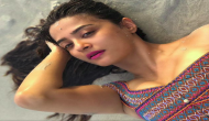 Sizzling Surveen Chawla's latest hot ' bikini on beach' photos will raise your heartbeats; see pics at your own risk!