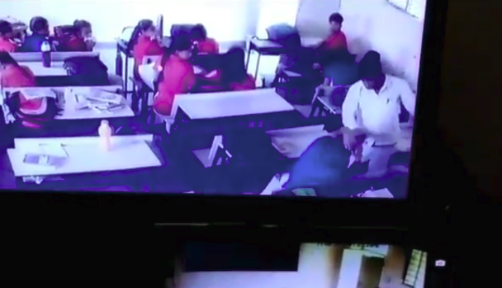 Teacher Beats Student