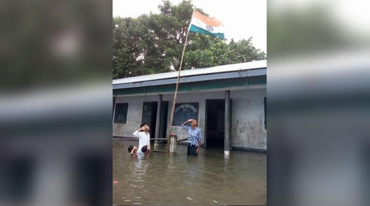Independence Day 2018: Kid whose picture standing in flood water and saluting Tricolour on 15th August went viral; out of Assam NRC draft