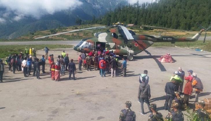 indian pilgrims in helicopter
