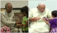 Raksha Bandhan: Children tie Rakhi to PM Modi, President Ram Nath Kovind