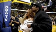 Fan rushes to stage at American singer couple Beyonce and Jay-Z's concert