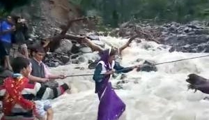 Uttarakhand: Sans bridge, villagers use rope to cross river