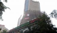 Equity indices flat amid volatile trade, M&M drops 6 pc