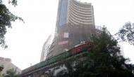 Equity indices edge higher, realty and financials gain