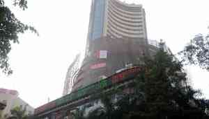 Equity indices trade flat as RBI keeps interest rates unchanged