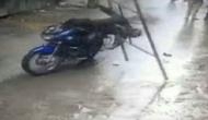 Bengaluru: CCTV footage captures how a biker escaped death as iron frame falls on him; see video