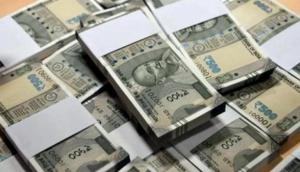Rupee hits new low of 73.34, plunges 43 paise against USD